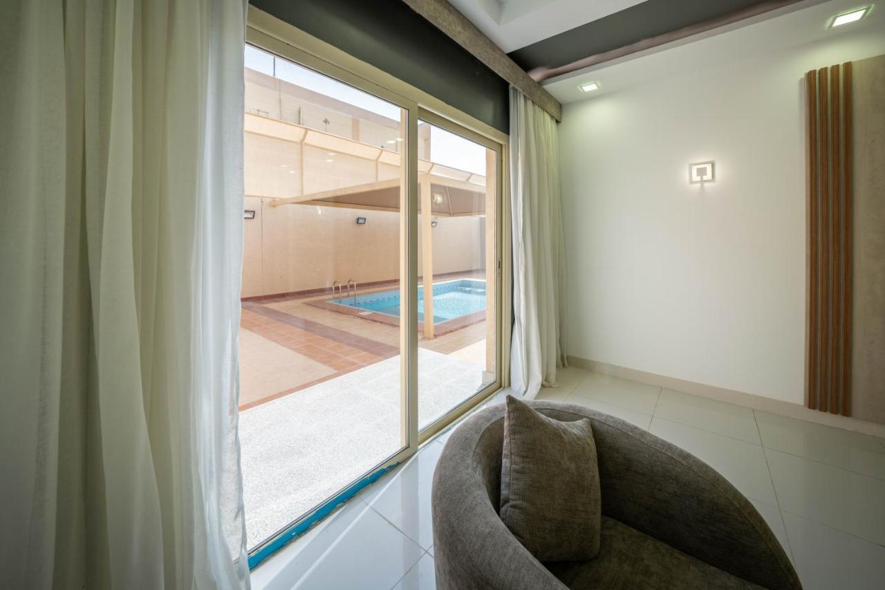 Mirada Gold Jizan - Resort & Private Pools Eksteriør billede A sliding window