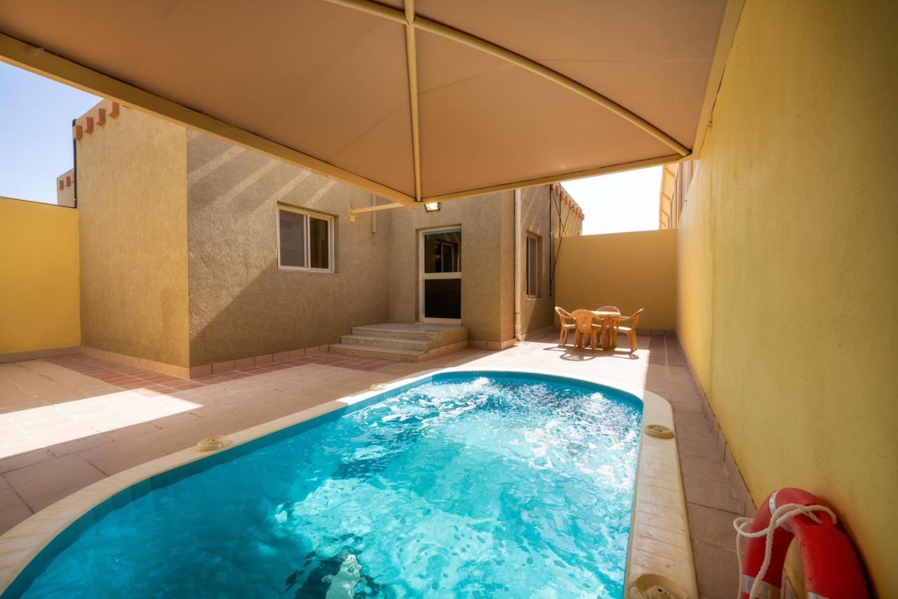 Mirada Gold Jizan - Resort & Private Pools Eksteriør billede A swimming pool in a hotel in Egypt